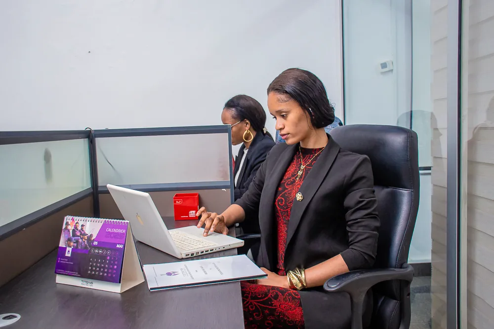 Titans office team working at their desks